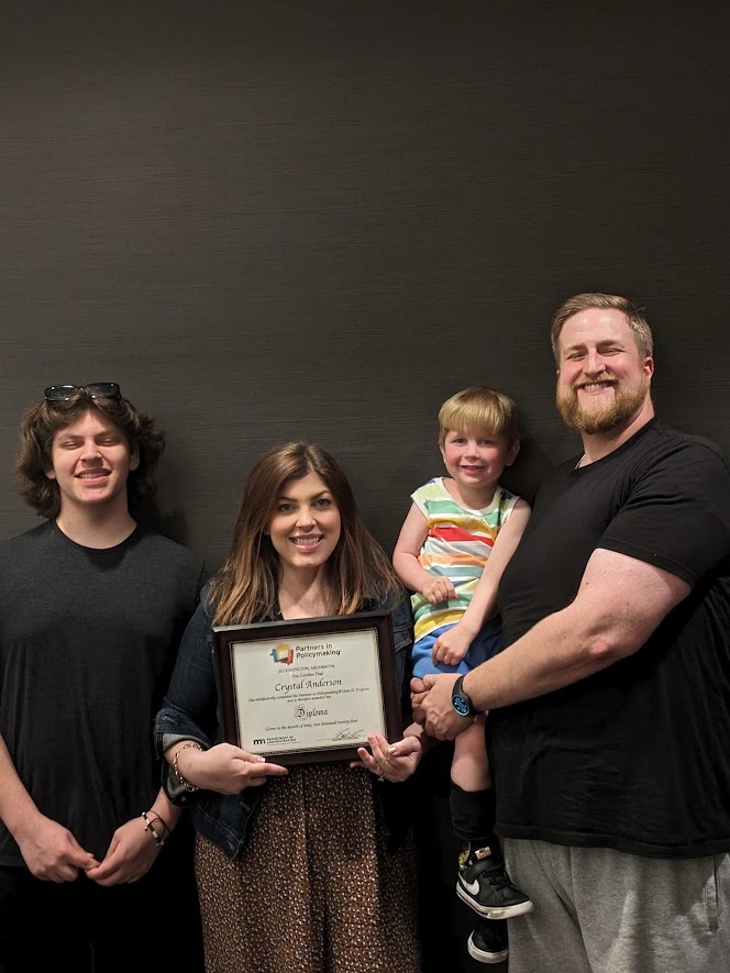 Crystal celebrating or attending a special moment